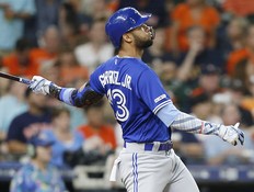 Lourdes Gurriel Jr. of the Toronto Blue Jays hits a two run home run in the fifth inning against the Houston Astros at Minute Maid Park on June 16, 2019 in Houston, Texas. (Photo by Bob Levey/Getty Images)