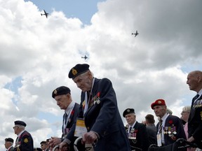 Canadian veterans are pictured at Juno beach after the international ceremony in Courseulles-sur-Mer, Normandy, northwestern France, on June 6, 2019, as part of D-Day commemorations marking the 75th anniversary of the Second World War beach landing. (AFP/Getty Images)