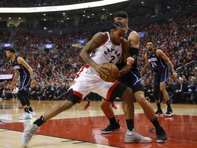 Toronto Raptors’ Kawhi Leonard drives to the hoop against Orlando Magic power forward Aaron Gordon during their first round matchup in April. After losing the opener, the Raps bounced back to win the next four games. (Jack Boland/Toronto Sun)