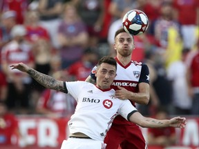 Toronto FC midfielder Jay Chapman and FC Dallas defender Bressan  fight for the ball last week. (USA TODAY SPORTS)