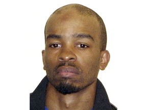 This undated photo provided July 22, 2013 by the Cuyahoga County Sheriff's Department in Ohio, shows suspected murderer Michael Madison.