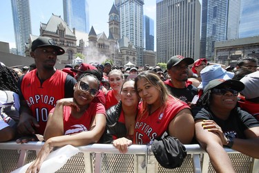 Fans gather in Nathan Phillips Square at City Hall during the Toronto Raptors championship parade. Mandatory Credit: John E. Sokolowski-USA TODAY Sports