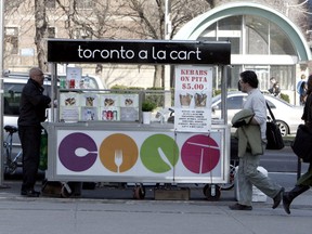 Toronto Sun file photo of Issa Ashtarieh, one of eight vendors who were in the Toronto a la Cart program, serving up some shwarma from his stand near Queen's Park in 2011.