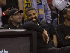 Drake watches from his courtside seat as the Toronto Raptors host the Golden State Warriors at the Scotiabank Arena in Game 2 of the NBA Finals on Sunday, June 2, 2019.Stan Behal /Toronto Sun