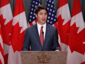 In this file photo taken on May 30, 2019 Canadian Prime Minister Justin Trudeau speaks during a joint press conference with the US Vice President in Ottawa, Ontario. - Canada will ban single use plastics from 2021, including bags, coffee cup lids and bottles, Prime Minister Justin Trudeau announced on June 10, 2019. In an announcing the decision, Trudeau said that in Canada less than 10 percent of plastics are currently recycled.