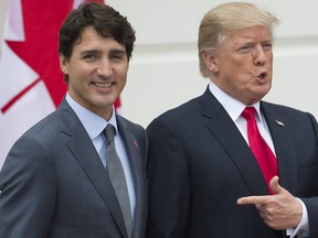 Canadian Prime Minister Justin Trudeau, left, alongside U.S. President Donald Trump on October 11, 2017