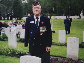 Veteran Allan Bacon at a Canadian cemetery in Beny-sur-Mer, France. (File photo)