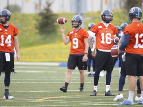 Argonauts Canadian QBs Brandon Bridge (left) and Michael O’Connor chat during the first week of training camp. Both 
QBs are trying to make the team.   Jack Boland/Toronto Sun