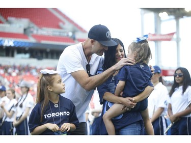 Toronto Argonauts quarterback Ricky Ray with his family acknowledges the crowd in a pre-game ceremony for his retitrement  Toronto, Ont. on Saturday June 22, 2019. Jack Boland/Toronto Sun/Postmedia Network