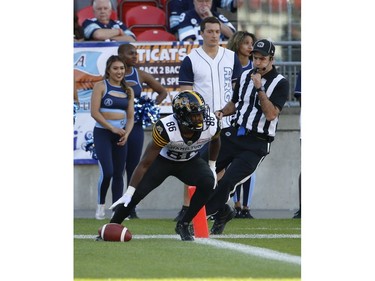 Hamilton Tiger Cats Bralon Addison WR (86) scores his third touchdown of the game during the fourth quarter in Toronto, Ont. on Saturday June 22, 2019. Jack Boland/Toronto Sun/Postmedia Network