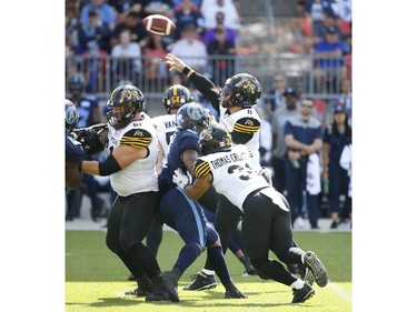 Hamilton Tiger Cats Jeremiah Masoli QB (8) fires a ball across the middle during the first quarter in Toronto, Ont. on Saturday June 22, 2019. Jack Boland/Toronto Sun/Postmedia Network