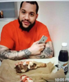 Jahmal “Bambino” Richardson is seen holding a cellphone and eating steak while in jail.(Photo courtesy CityNews Toronto)