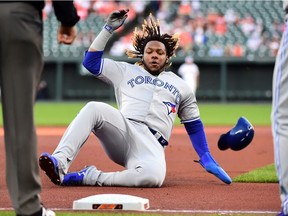 Toronto Blue Jays third baseman Vladimir Guerrero Jr. slides into third base in the first inning against the Baltimore Orioles at Oriole Park at Camden Yards.