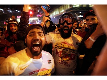 Fans celebrate after the Toronto Raptors defeated the Golden State Warriors in Oakland, California in Game Six of the best-of-seven NBA Finals, in Toronto, Ontario, Canada, June 14, 2019.