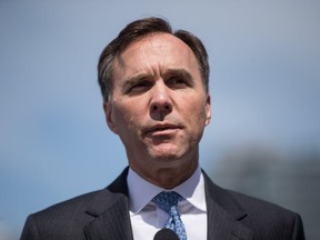 Federal Minister of Finance Bill Morneau speaks during a news conference after attending a meeting about money laundering and terrorist financing, in Vancouver, on Thursday, June 13, 2019. (THE CANADIAN PRESS/Darryl Dyck)