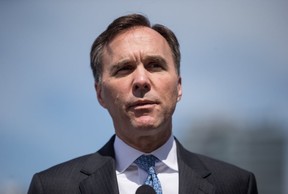 Federal Minister of Finance Bill Morneau speaks during a news conference after attending a meeting about money laundering and terrorist financing, in Vancouver, on Thursday, June 13, 2019. (THE CANADIAN PRESS/Darryl Dyck)