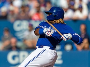 Toronto Blue Jays third baseman Vladimir Guerrero Jr. (27) hits a single and breaks his bat during the eighth inning against the Arizona Diamondbacks at Rogers Centre. (Kevin Sousa-USA TODAY Sports)