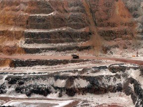 In this file photo taken on March 21, 2012, a mining truck travels through the ArcelorMittal mining complex in Fermont, Quebec. (GERALDINE WOESSNER/AFP/Getty Images)