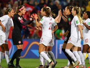 Canada's players celebrate at the end of their Women's World Cup match against Cameroon, on June 10, 2019, at the Mosson Stadium in Montpellier, France.
