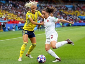 Allysha Chapman of Canada is challenged by Sofia Jakobsson of Sweden during the 2019 FIFA Women's World Cup France Round Of 16 match between Sweden and Canada at Parc des Princes on June 24, 2019 in Paris, France. (Photo by Richard Heathcote/Getty Images)