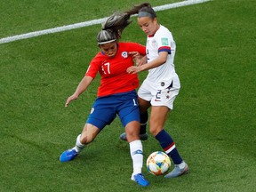 Chile's Javiera Toro in action with Mallory Pugh of the U.S. at the 2019 FIFA Women's World Cup at the Parc des Princes stadium in Paris, France on June 16, 2019.