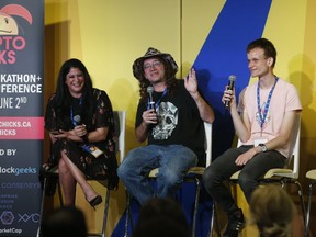 Toronto Sun Editor-in-Chief Adrienne Batra moderated the Crypto-Chicks 2019 Hackathon as Ben Goertzel (middle) and Vitalik Buterin (right) talked about crypto currency and blockchains on Saturday June 1, 2019. (Jack Boland/Toronto Sun/Postmedia Network)