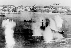In this file photo taken on June 06, 1944 Allied ships are attacked by German fighters as the largest massed assault of World War II begins to land men and supplies on the coast of northern France. (AFP/Getty Images)