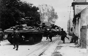 In this file photo taken on June 06, 1944 the first tanks enter the Sword Beach, near Ouistreham during the Normandy landing, France. (AFP/Getty Images)
