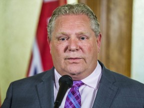 Ontario Premier Doug Ford  addresses media outside of the Premier's office at Queen's Park in Toronto  on May 27, 2019.
