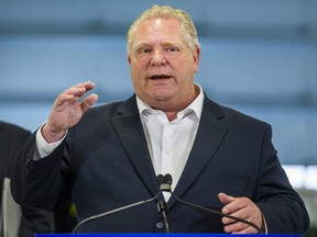 Ontario Premier Doug Ford addresses media at the Thorncrest Ford car dealership in Toronto on April 1, 2019.