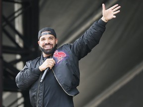 Drake addresses the Toronto Raptors during a rally at Toronto city hall Nathan Phillips Square. (John E. Sokolowski-USA TODAY Sports)