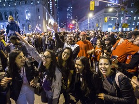 Fans fill the streets of downtown Toronto, Ont. celebrating the Toronto Raptors victory over the Golden State Warriors in the NBA Finals on Friday June 14, 2019. (Ernest Doroszuk/Toronto Sun/Postmedia)