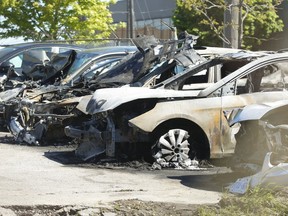 Toronto Police are investigating a possible arson that occurred early Thursday morning in an impound yard on Sinnott Rd. in Scarborough southwest of Birchmount Rd. An Eglinton Ave. E. Five cars were set on fire and a gas can was recovered at the scene.on Friday, June 7, 2019. (Jack Boland/Toronto Sun/Postmedia Network)