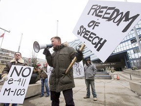 Event organizer Stephen Garvey speaks during his anti-Motion 103 rally outside of City Hall in Calgary, Alta., on Saturday, March 4, 2017. (Postmedia file photo)