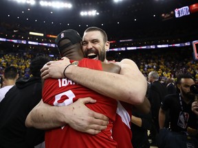 Raptors’ Marc Gasol celebrates with teammate Serge Ibaka following Toronto’s win over the Golden State Warriors in Game 6 of the NBA Finals  to capture the league title in Oakland on Thursday night. (GETTY IMAGES)