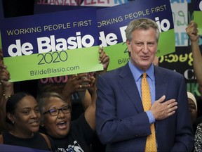 Democratic presidential candidate and New York City Mayor Bill de Blasio acknowledges the crowd as he takes the stage at the New York Hotel and Motel Trades Council (HTC) headquarters in Midtown Manhattan, June 5, 2019 in New York City. (Drew Angerer/Getty Images)