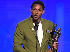Lou Williams accepts the Kia NBA Sixth Man of the Year Award onstage during the 2019 NBA Awards presented by Kia on TNT at Barker Hangar on June 24, 2019 in Santa Monica, Calif. (Kevin Winter/Getty Images for Turner Sports)