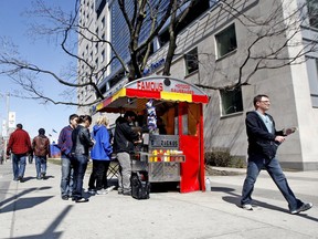 File photo of Hot Dog cart on University Ave. at Gerrard St. in 2010. (Dave Abel / Toronto Sun)