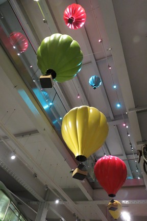 Balloons attached to ceiling of M-Shed’s main floor display area depict early flight in Bristol. (Ian Robertson)