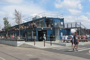 Shops, cafes, bars, barbers and hair-dressing salons inconverted cargo containers on Gaol Ferry Steps, Wapping Wharf, behind M Shed in Bristol. (Ian Robertson)