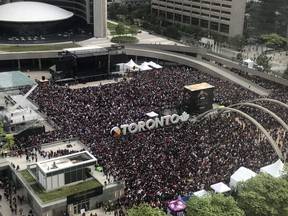 Fans gather in Nathan Phillips Square outside Toronto City Hall ahead of the Raptors rally which will follow the parade, Monday, June 17, 2019. Emma Kirk photo