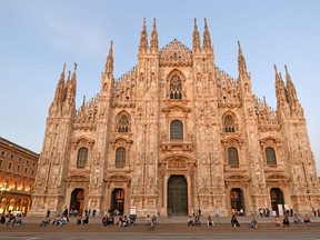 Made of pink marble and decorated with Gothic spires, Milan's cathedral is one of the largest in Europe. (Cameron Hewitt)