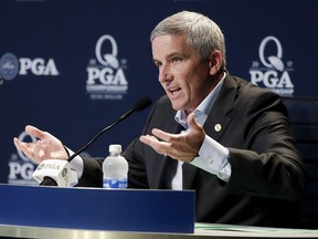 PGA Tour Commissioner Jay Monahan speaks during a news conference at the PGA Championship at the Quail Hollow Club Tuesday, Aug. 8, 2017, in Charlotte, N.C. (AP Photo/Chris Carlson)