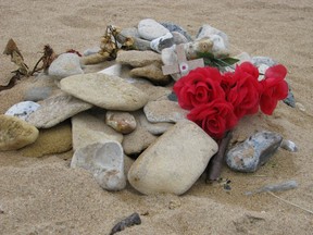 A tribute to Canadian soldiers on the sand at the Juno Beach Centre in Courseulles-sur-Mer, Normandy. (ROBIN ROBINSON/TORONTO SUN/FILE PHOTO)