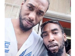 Kawhi Leonard on vacation in Barabdos wearing a Toronto Blue Jays jersey.