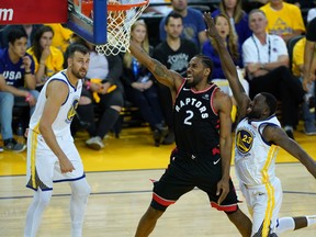 Raptors star Kawhi Leonard drives to the basket in 
Game 3 against the Golden State Warriors on Wednesday night in a 123-109 victory.  
(Getty Images)