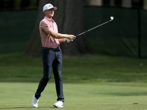 Mackenzie Hughes plays his shot on the eighth hole during the Rocket Mortgage Classic at the Detroit Country Club on Thursday, June 27, 2019 in Detroit.