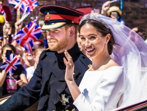 Prince Harry, Duke of Sussex and Meghan, Duchess of Sussex leave Windsor Castle in the Ascot Landau carriage during a procession after getting married at St. George’s Chapel in Windsor May 19, 2018 (Dutch Press Photo/WENN.com)