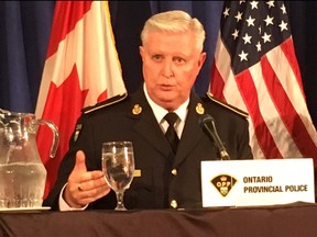 OPP Det. Insp. David MacDonald briefs reporters on a massive child pornography bust.