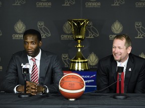 Nick Nurse (right) is introduced as the new head coach of the Senior Men’s National Team yesterday by general manager 
Rowan Barrett. 
(THE CANADIAN PRESS)